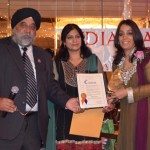 Indian American Forum honored women during Women's History month.Mohinder Taneja and Sukhwinder Ranu present award to Chanbir Kaur