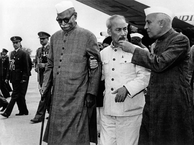 Homai Vyarawalla, Indian (1913 – 2012) Ho Chi Minh, President of North Vietnam being escorted by Pandit Nehru and Dr. Rajendra Prasad; 1958 Gelatin Silver Print Alkazi Collection of Photography