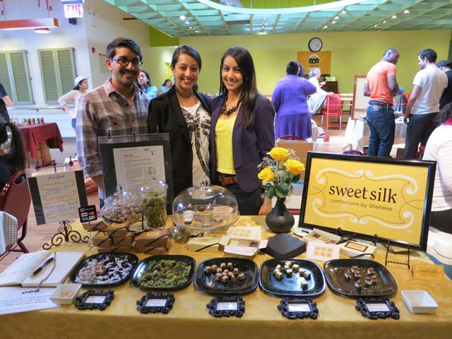Shefalee and her siblings display their Sweet Silk products at market