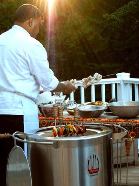 Hemant Mathur cooks at the Homdoor, a tandoor or Indian oven for the home