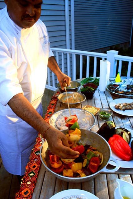 Chef Hemant Mathur prepares skewers