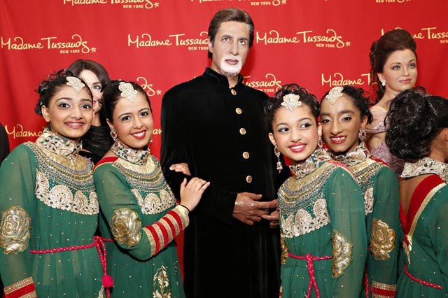 Dancers with wax replica of Amitabh Bachchan