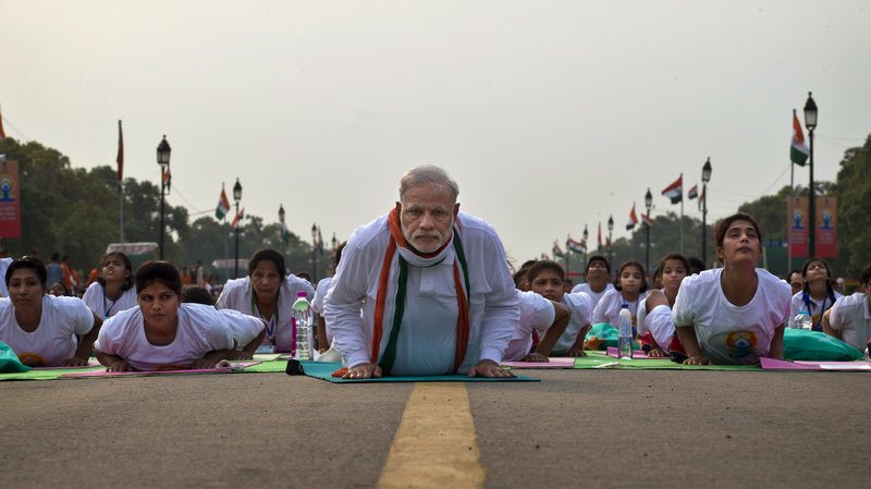 Prime Minister Narendra Modi leads a yoga class