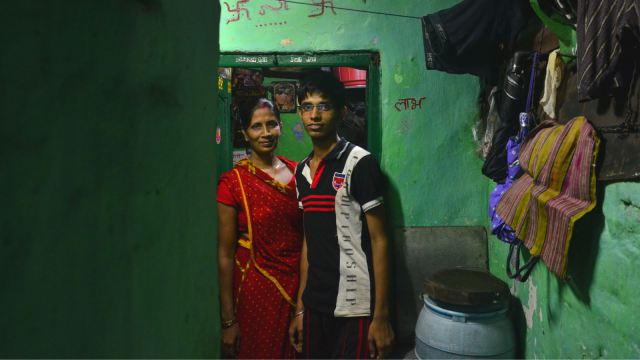 Bachchi Devi and Niraj outside their house.(Devjyot Ghoshal/Quartz) 