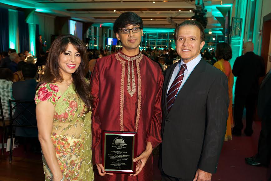 Manjul Bhargava with Poonam and AJ Khubani, Sponsors of the Making a Difference Award