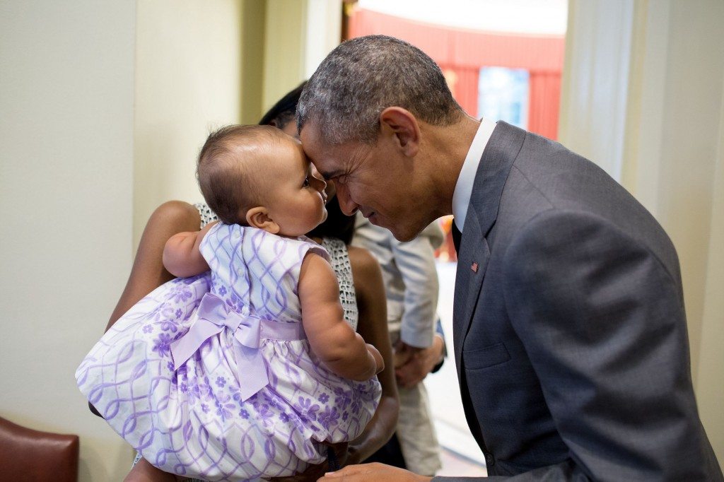 The President greets nine-month-old Josephine Gronniger, whose father, Tim Gronniger, brought his family by the Oval Office for a family photo.” (Official White House Photo by Pete Souza)