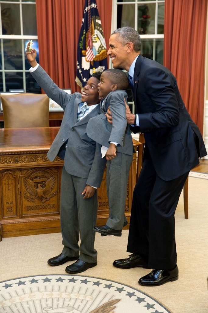 “The President acquiesced to a selfie with 11-year-old Jacob Haynes and four-year-old James Haynes after taking a family photograph with departing White House staffer Heather Foster.” (Official White House Photo by Pete Souza)