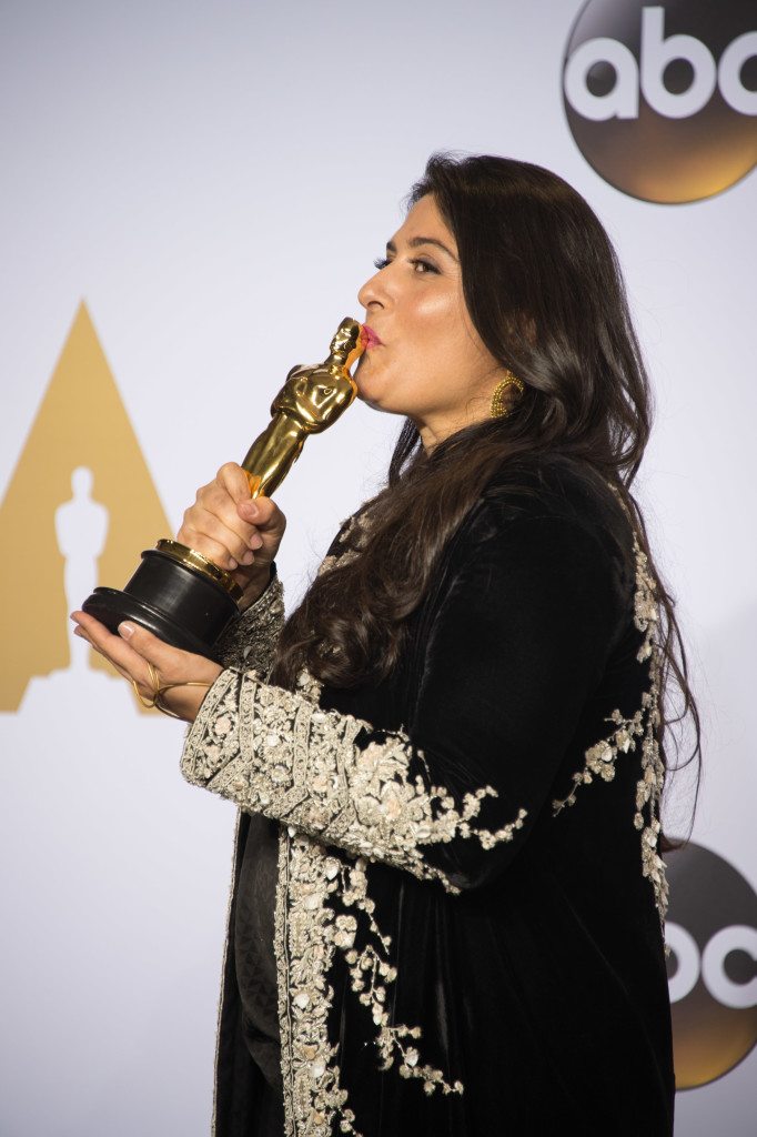 Sharmeen Obaid-Chinoy poses backstage with the Oscar® for Best documentary short subject, for work on “A Girl in the River: The Price of Forgiveness” 