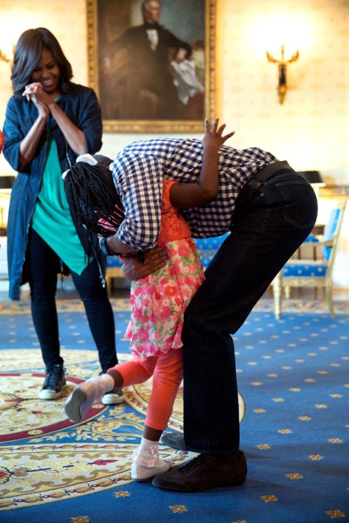 5. March 28, 2016 “The First Lady watches as President Obama gives a hug to Caprina Harris before the annual Easter Egg Roll. Caprina had burst out in tears when she was told by her family that Obama would no longer be President; the resulting YouTube video went viral and President Obama responded to her on Facebook and said he wasn’t going anywhere. They finally had a chance to meet here.” (Official White House Photo by Pete Souza)