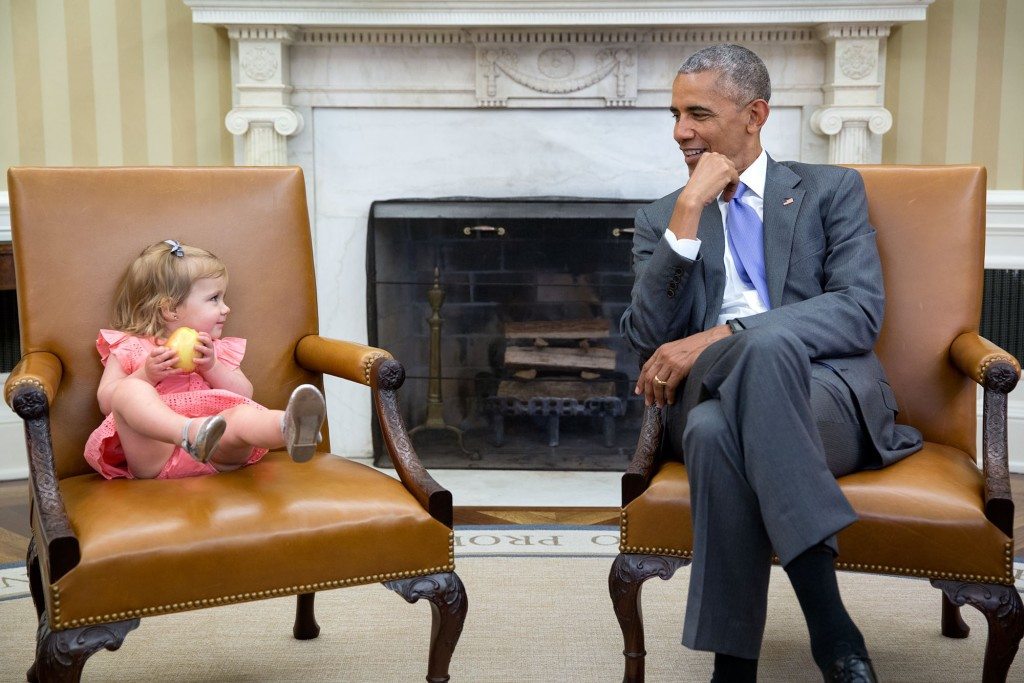 7.June 22, 2016 “The great thing about children is you just don’t know what they will do in the presence of the President. So when David Axelrod stopped by the Oval Office with one of his sons’ family, Axe’s granddaughter, Maelin, crawled onto the Vice President’s seat while the President continued his conversation with the adults. Then at one point, Maelin glanced over just as the President was looking back at her.” (Official White House Photo by Pete Souza)