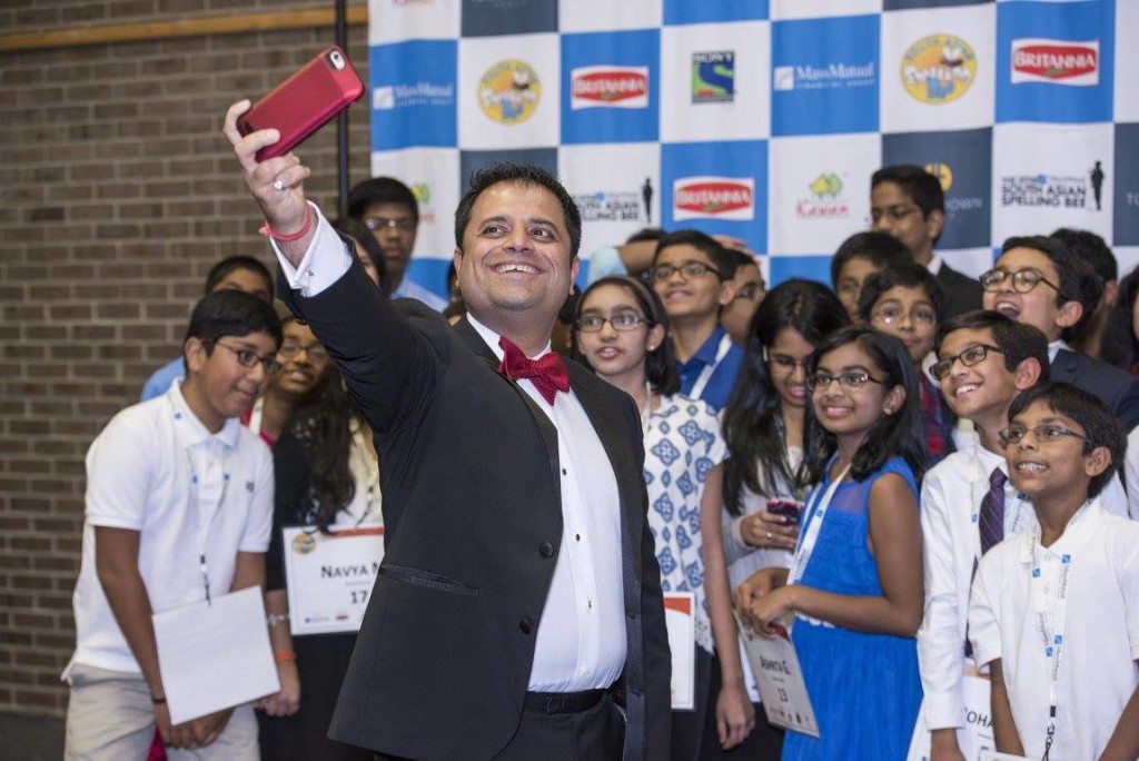 Rahul Walia takes a selfie of success with participants in the South Asian Spelling Bee