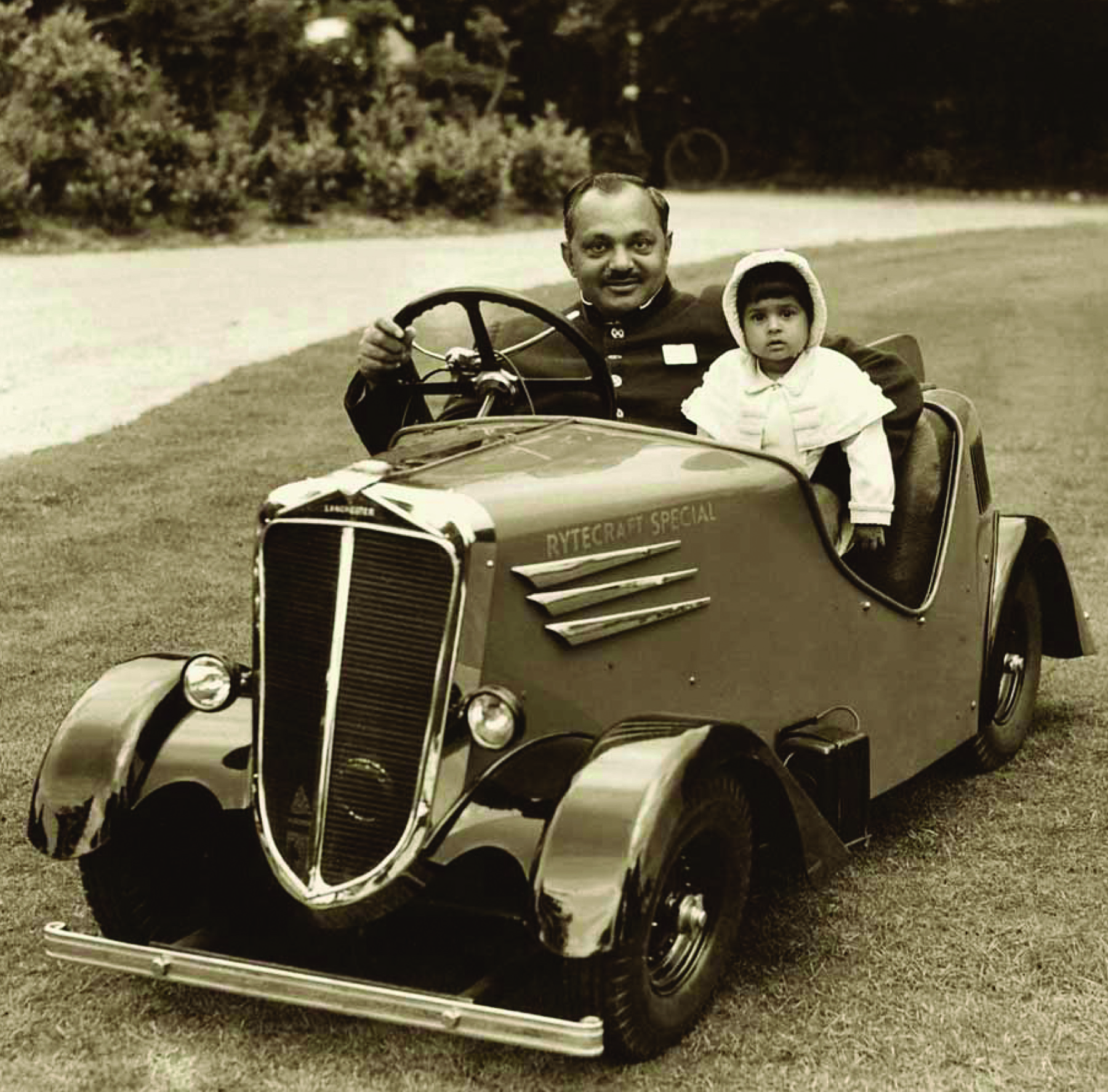 Princess Harshad Kumari with her father, Jam Saheb Digvijaysinhji of Nawanagar, c. 1939.This car was custom-made for the young princess but when admired by the young prince of Jaipur, Bhawani Singh, it was given to him as a birthday present.