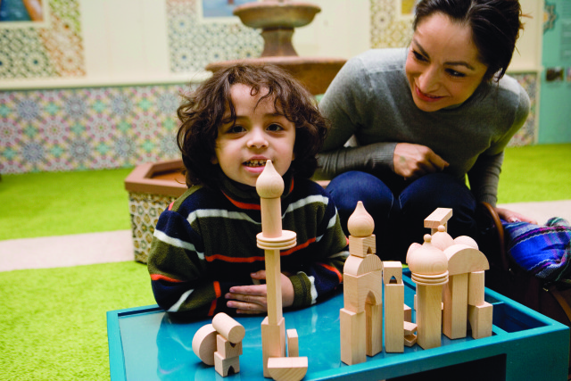 A child builds minarets