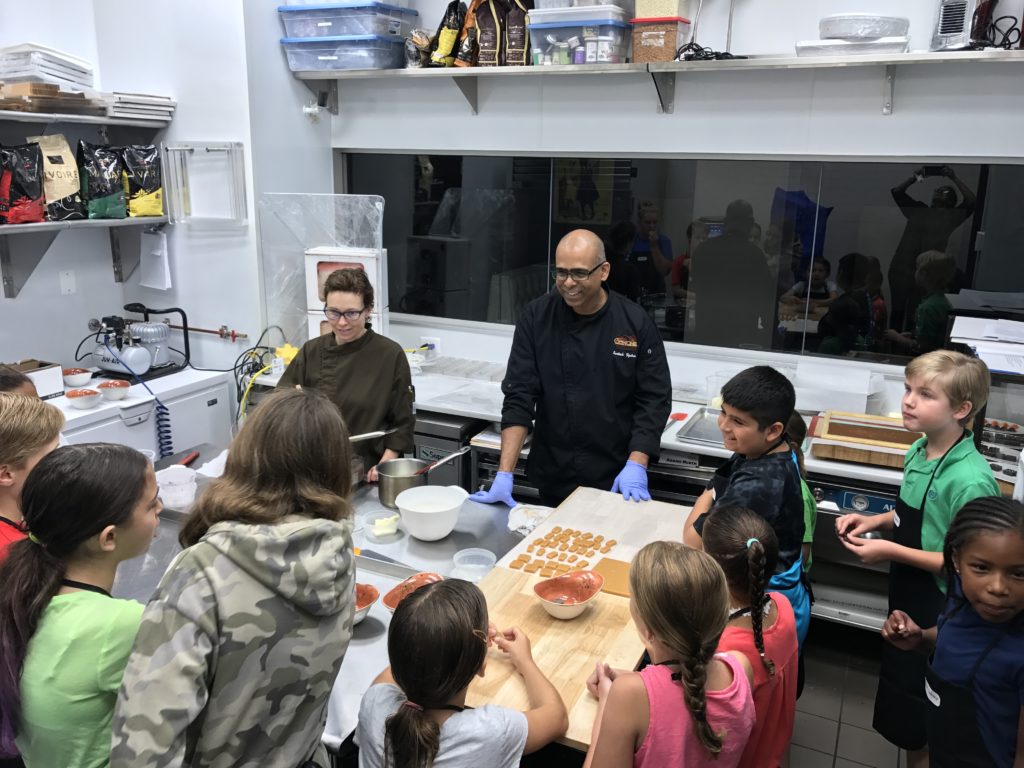 Santosh Tiptur conducts a chocolate making class for kids at Conche