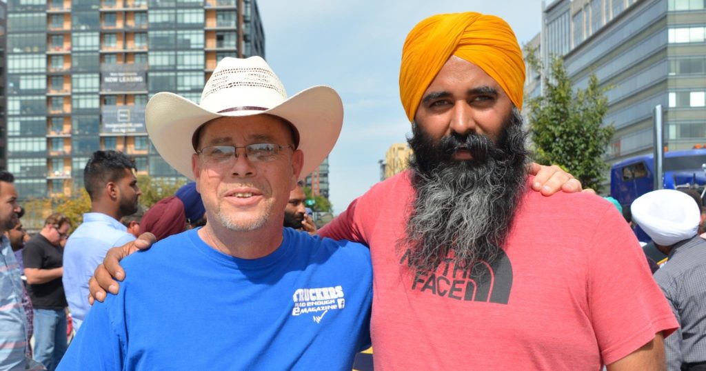 Mintu Pandher with a fellow trucker in Washington