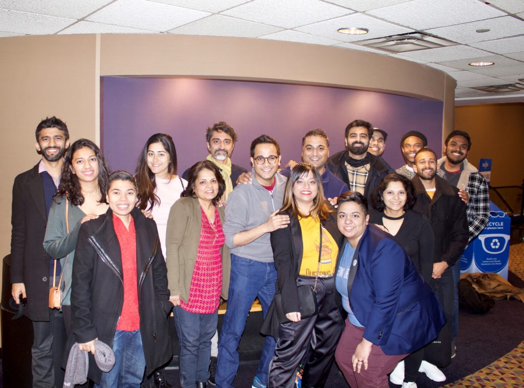 Priya Arora (front row, burgundy pants), her wife Reema Tharani (left of Priya), Vaibhav Jain (first row, gray fleece) and his husband Parag Mehta (behind Reema) attend the special screening of Shubh Mangal Zyada Saavdhan organized by Queering Desi in New York.