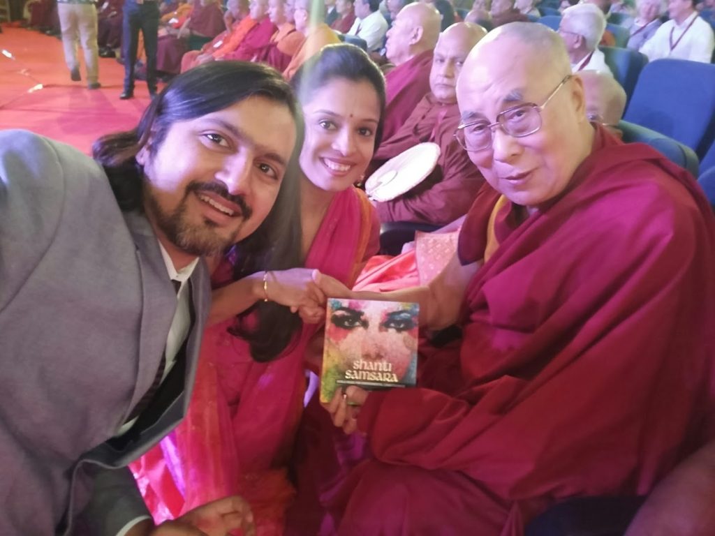Sharing a copy of Shanti Samsara with His Holiness the Dalai Lama
