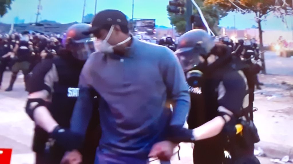 Reporter arrested during protests