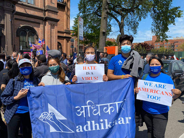 Hate is a virus - Adhikar volunteers