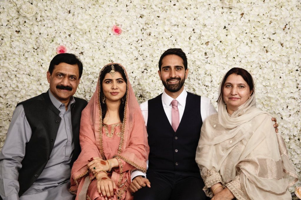 Malala and Asser with her parents