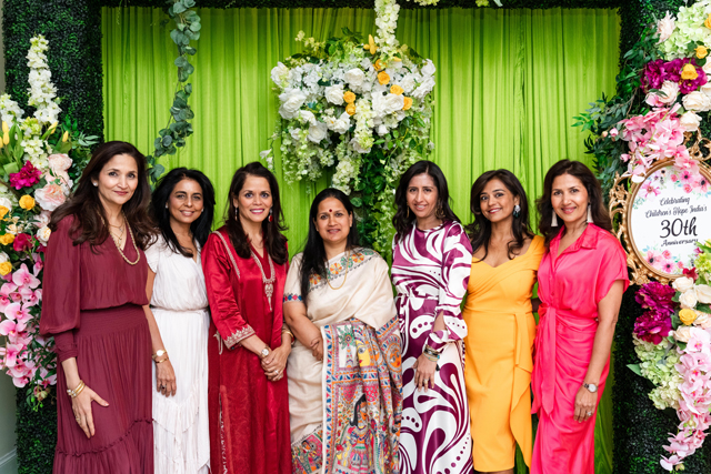 Honoree Mona Sinha and Dr. Abha Jaiswal with CHI luncheon Benefit Committee -