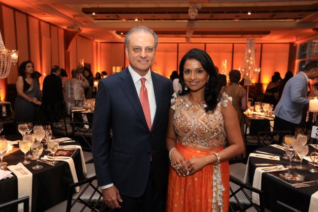 Co-hosts Preet Bharara and Reena Ninan