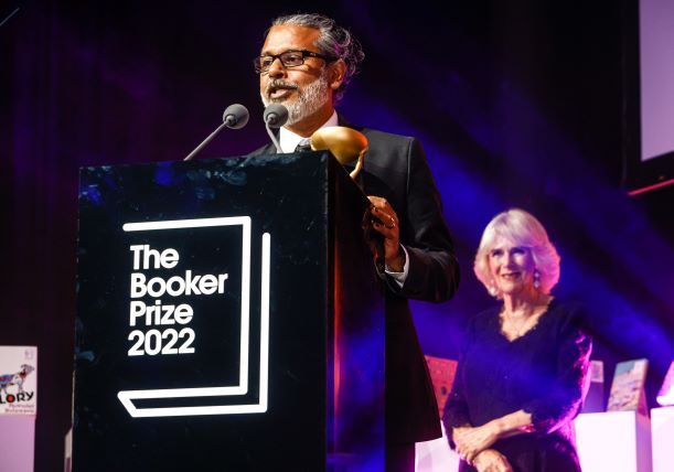 Her Majesty The Queen Consort and Shehan Karunatilaka, winner of the Booker Prize 2022 at the Roundhouse, London. Credit – Booker Prize Foundation (2)