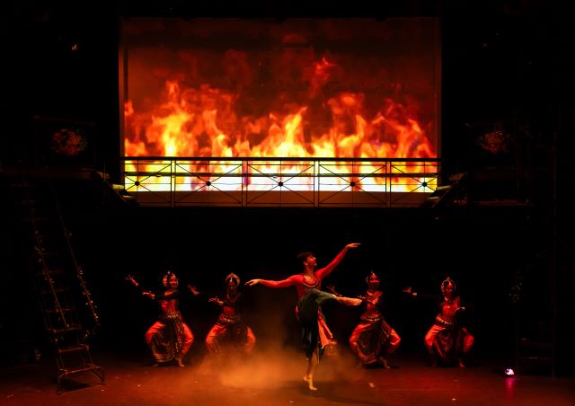 Hanuman sets Lanka on fire with his burning tail. Dancers depict fire in this scene from Rmaavan