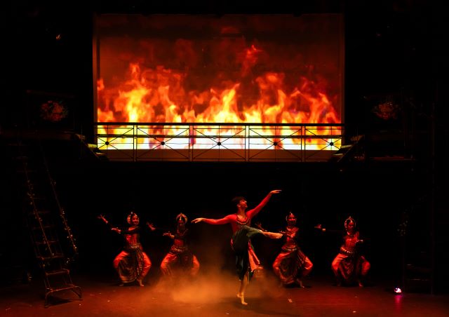 Hanuman sets Lanka on fire with his burning tail. Dancers depict fire in this scene from Rmaavan