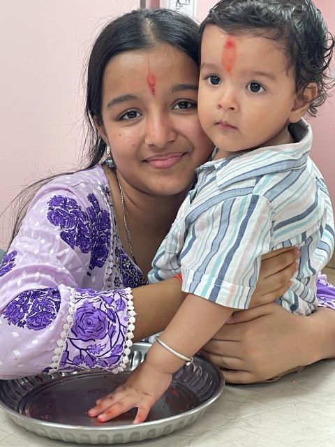 Families celebrating Janmashtami