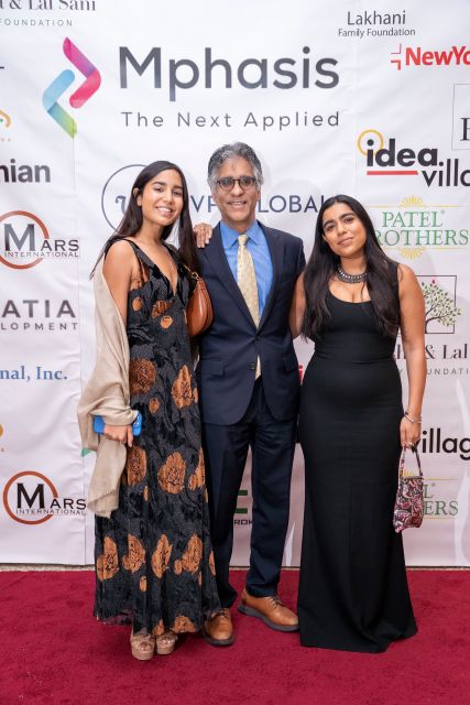 Suresh Sani with his daughters at CHI Gala