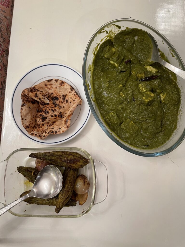 A vegetarian Sindhi meal - Spinach-paneer and Karela (bitter gourd) with roti