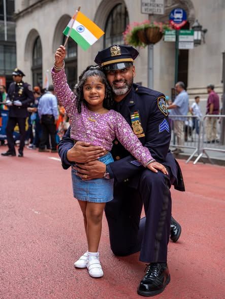 Celebrating India's Independence with an officer from the NYPD